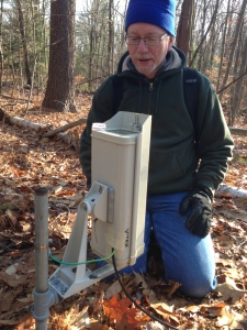 Emery Boose setting up the Witness Tree Cam at the Harvard Forest. 